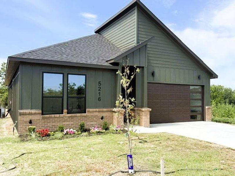 Front exterior of a new home in , Fort Worth, TX, highlighting curb appeal (Image 2). Front exterior of a new home in , Fort Worth, TX, highlighting curb appeal (Image 2).