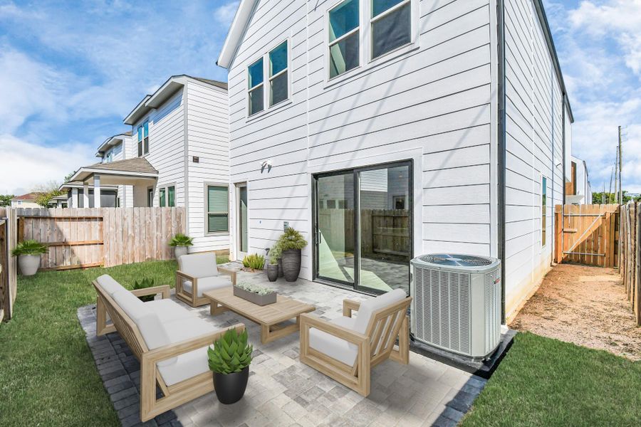 Exterior details and patio area of a home in Antigua, Houston (Image 3).