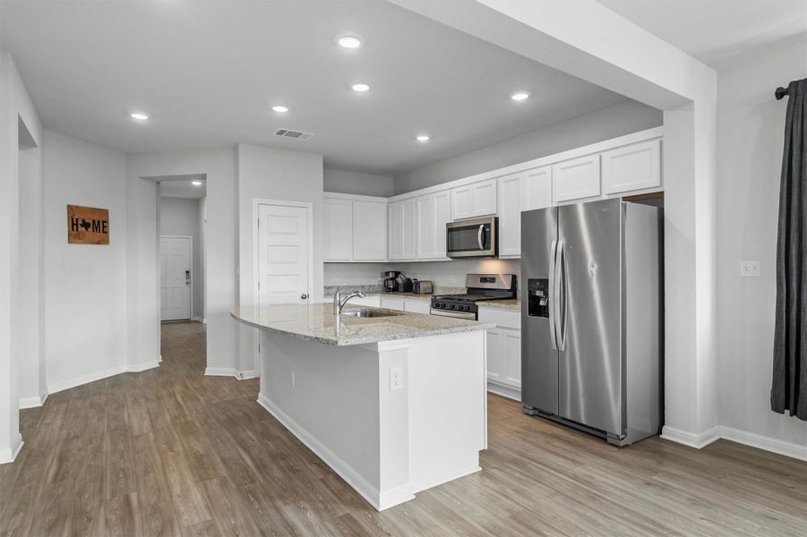 Furnished interior view inside a new home in The Ridge at Trinity Ranch, Elgin (Image 15).