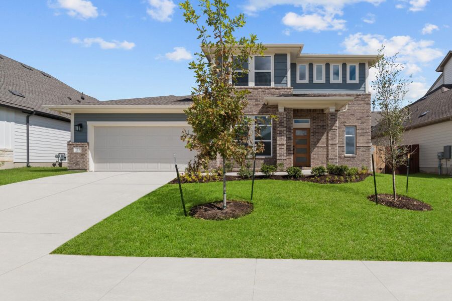 Representative exterior photo of a completed home built from the The Stagecoach by David Weekley Homes in Sunfield, Buda, TX (Image 3). Representative exterior photo of a completed home built from the The Stagecoach by David Weekley Homes in Sunfield, Buda, TX (Image 3).