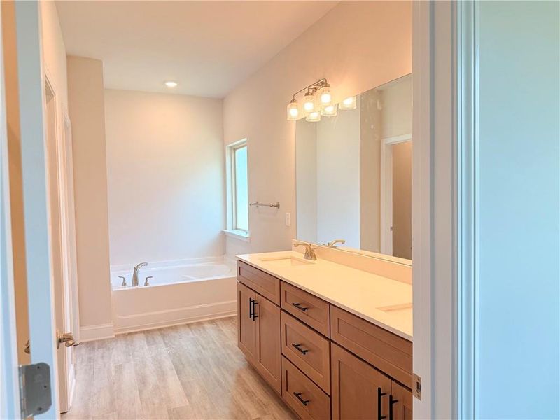 Furnished interior view inside a new home in Magnolia Villas, Cornelia (Image 11).