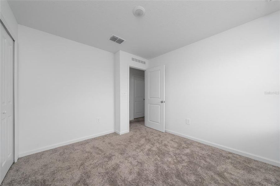 Spacious, unfurnished interior of a new home in Ranches at Lake Mcleod: Legacy Collection, Eagle Lake (Image 22).