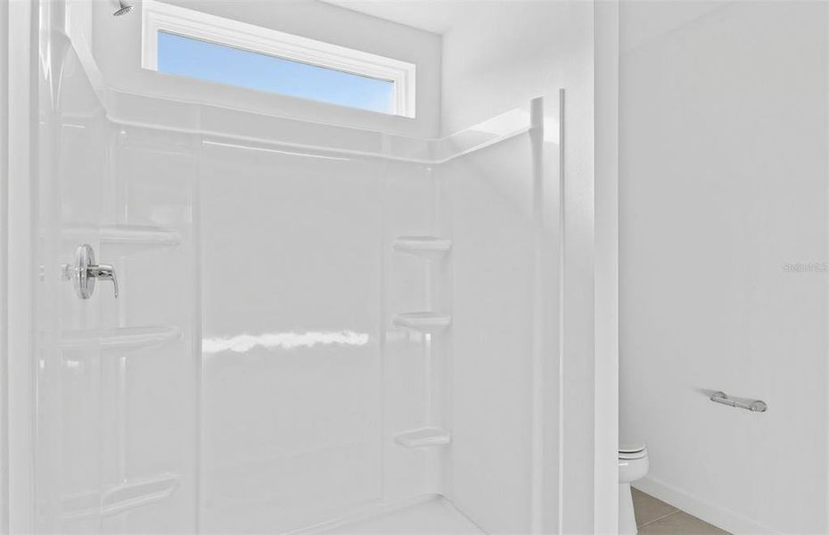 Spacious, unfurnished interior of a new home in Oakfield Lakes, Parrish (Image 15).
