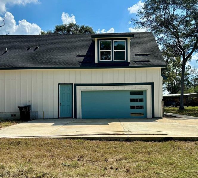 Front exterior of a new home in , Conroe, TX, highlighting curb appeal (Image 25).