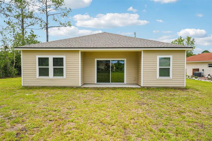 Exterior details and patio area of a home in , Palm Coast (Image 23).