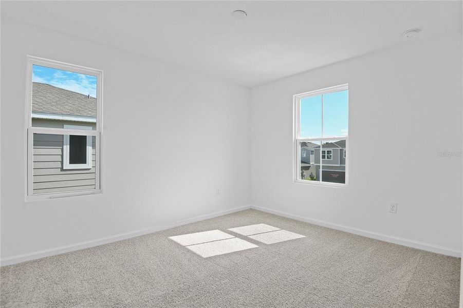 Spacious, unfurnished interior of a new home in Seasons at Shores of Lake Dell, Dundee (Image 5).