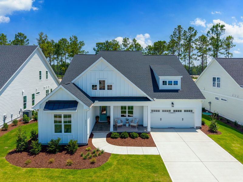Representative exterior photo of a completed home built from the Lumina Island by Kent Homes in Terrapin, Leland, NC (Image 36). Representative exterior photo of a completed home built from the Lumina Island by Kent Homes in Terrapin, Leland, NC (Image 36).