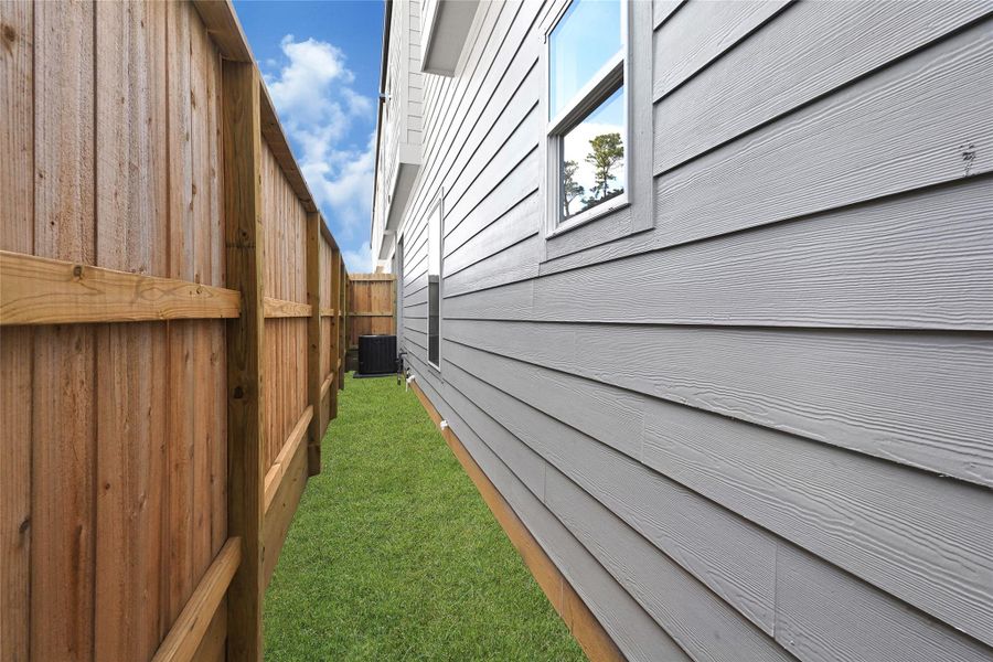 Exterior details and patio area of a home in , Houston (Image 19). Exterior details and patio area of a home in , Houston (Image 19).