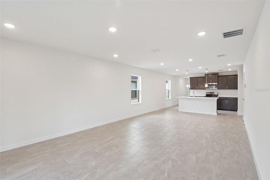 Spacious, unfurnished interior of a new home in Grasslands West, Lakeland (Image 13).