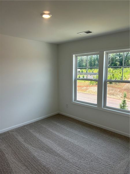 Natural light floods this spacious room, highlight Natural light floods this spacious room, highlight