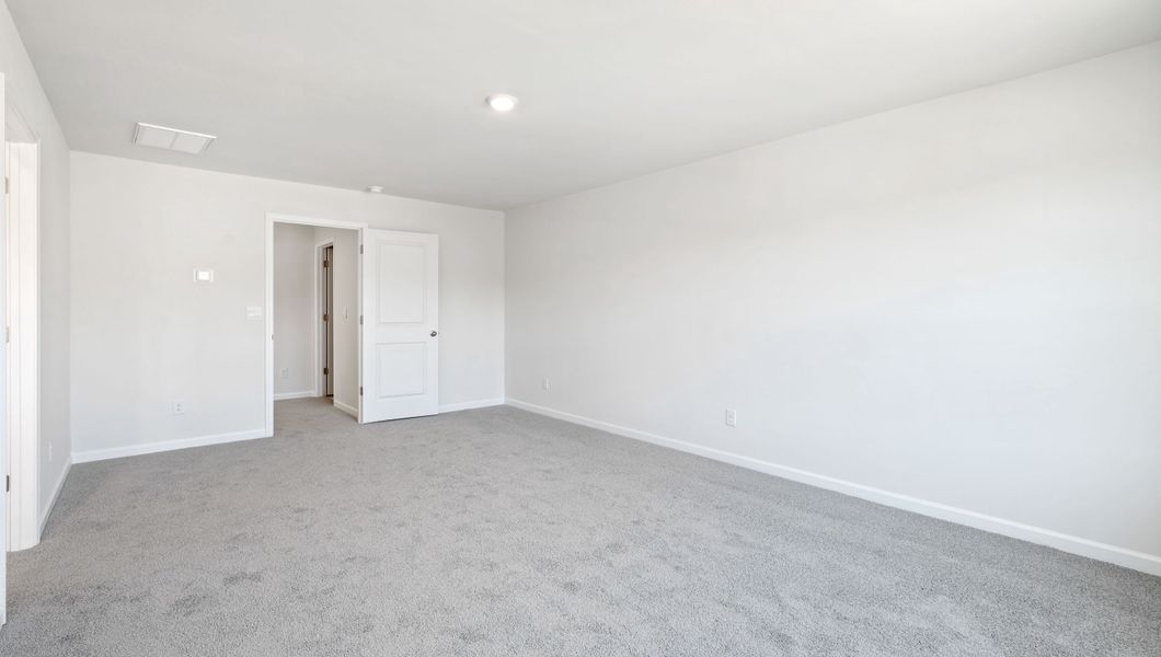 Spacious, unfurnished interior of a new home in Durbin Meadows Traditions, Fountain Inn (Image 27).