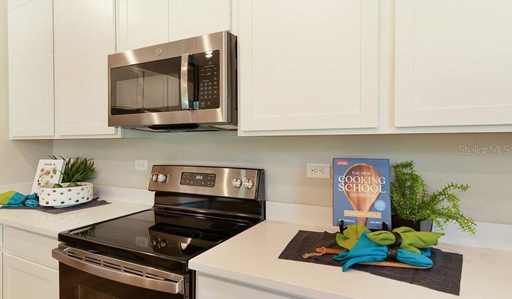 Furnished interior view inside a new home in Seasons at Shores of Lake Dell, Dundee (Image 9).