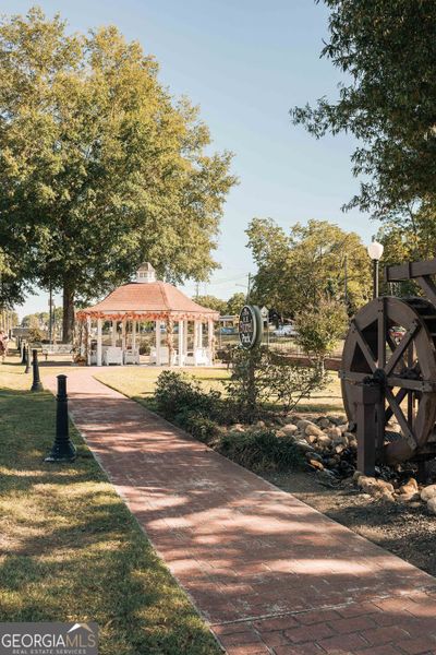 Front exterior of a new home in Summerlin, Winder, GA, highlighting curb appeal (Image 39). Front exterior of a new home in Summerlin, Winder, GA, highlighting curb appeal (Image 39).