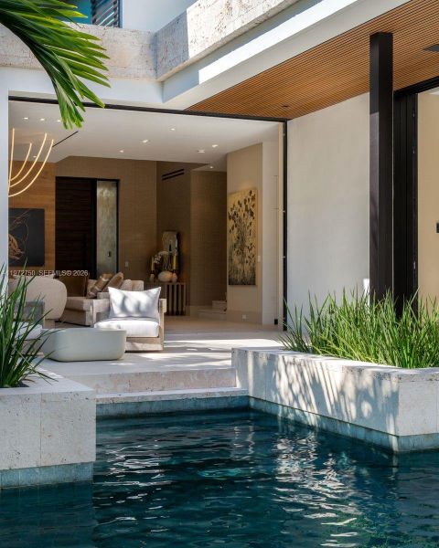 Exterior details and patio area of a home in , Miami Beach (Image 14). Exterior details and patio area of a home in , Miami Beach (Image 14).