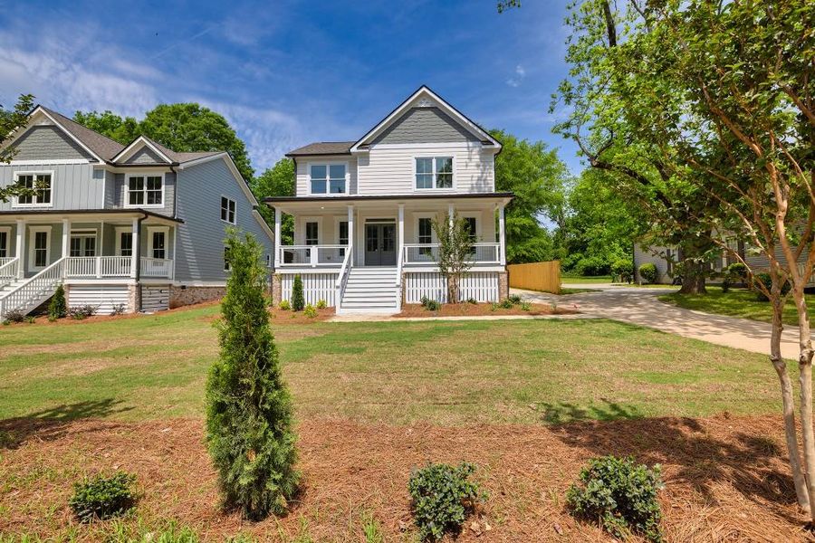Front exterior of a new home in East Marable Street, Monroe, GA, highlighting curb appeal (Image 23).