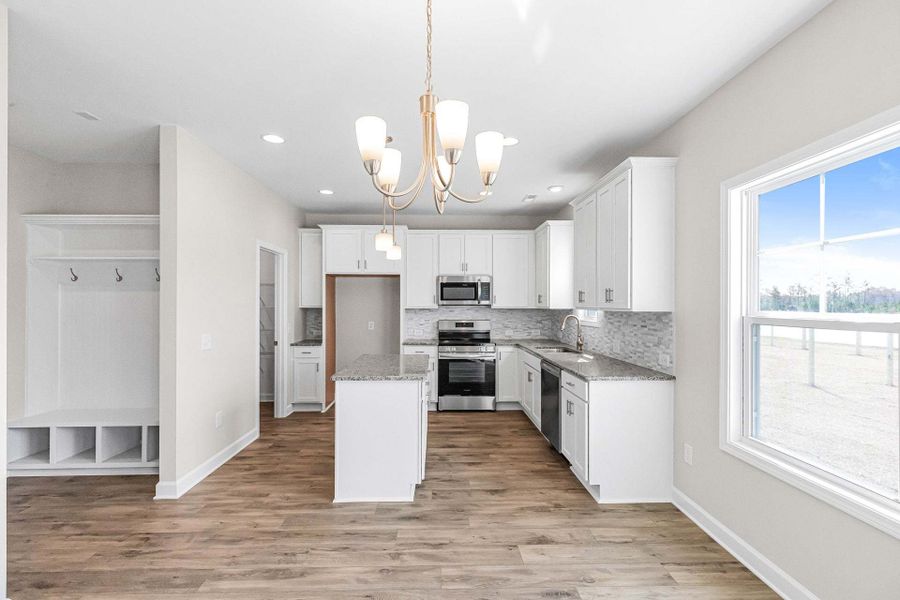 Representative furnished interior of a home built from the Magnolia by Caviness & Cates Communities in Bartlett Manor, Youngsville (Image 180).