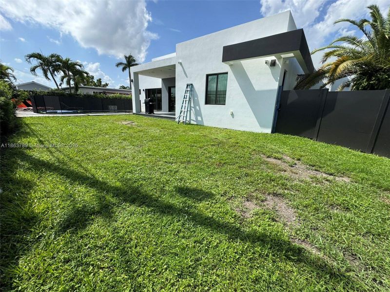Front exterior of a new home in , Miami, FL, highlighting curb appeal (Image 1).