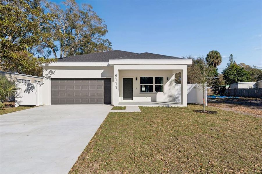 Front exterior of a new home in , St. Petersburg, FL, highlighting curb appeal (Image 25). Front exterior of a new home in , St. Petersburg, FL, highlighting curb appeal (Image 25).