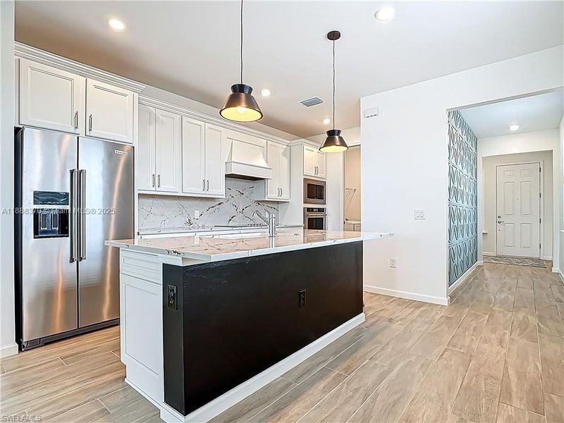 Furnished interior view inside a new home in , Ave Maria (Image 5).