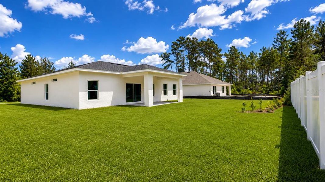Exterior details and patio area of a home in , Ocala (Image 3).
