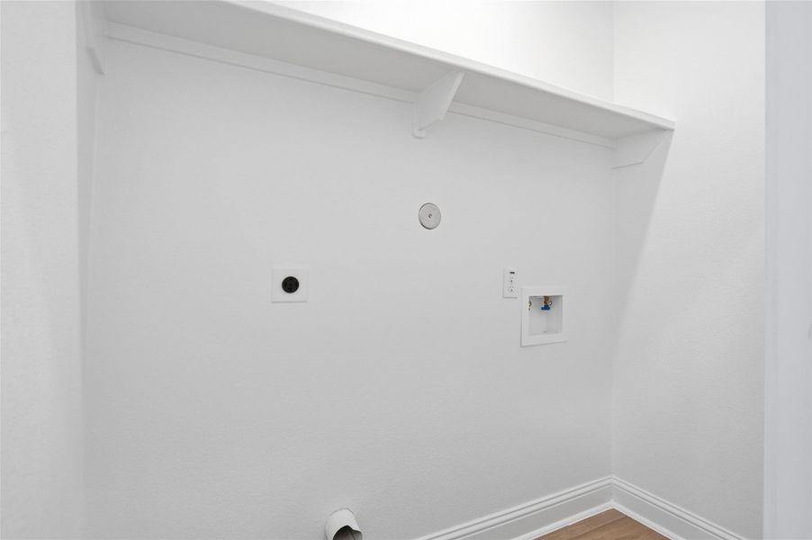 Washer and dryer area upstairs.