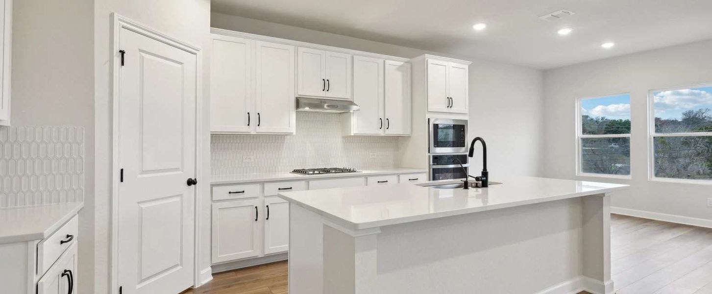 Representative furnished interior of a home built from the Makenzie by Ashton Woods in Hennersby Hollow, San Antonio (Image 3).