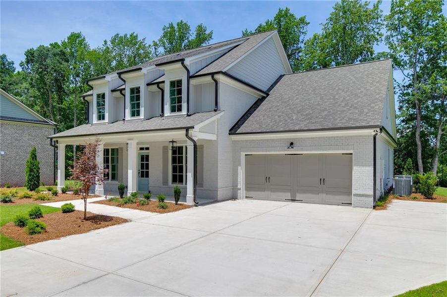 Front exterior of a new home in , Buford, GA, highlighting curb appeal (Image 29).