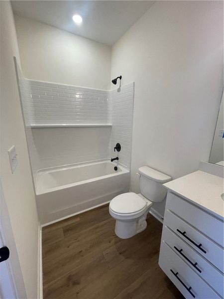 Furnished interior view inside a new home in Springwood Grove, Central (Image 5).