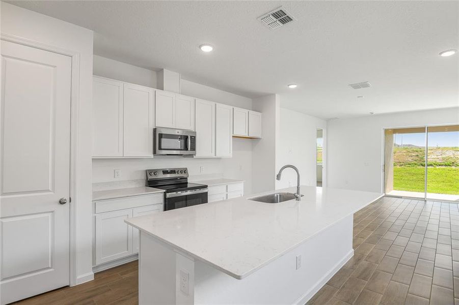 Furnished interior view inside a new home in Seasons at Scenic Terrace, Lake Hamilton (Image 6).