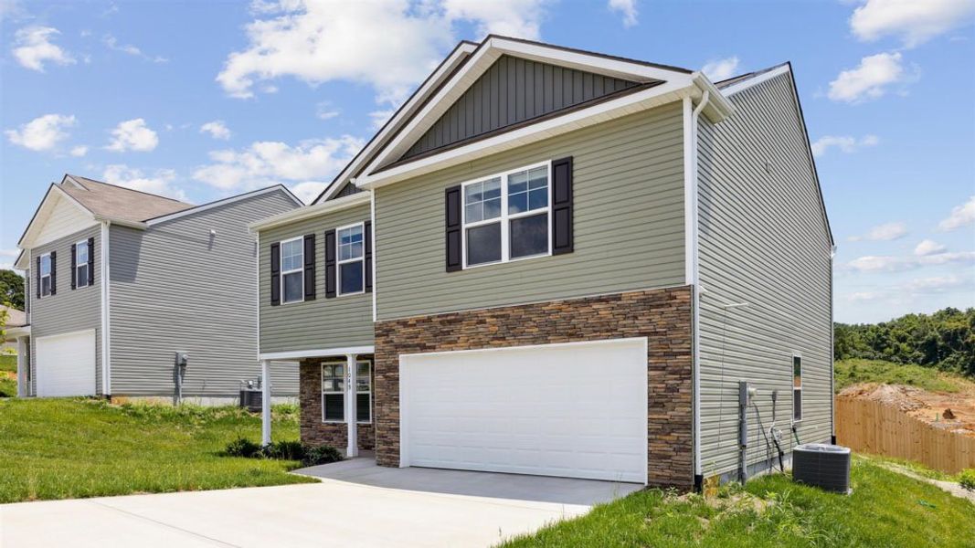 Representative exterior photo of a completed home built from the Penwell by D.R. Horton in Southwood, Morristown, TN (Image 2).
