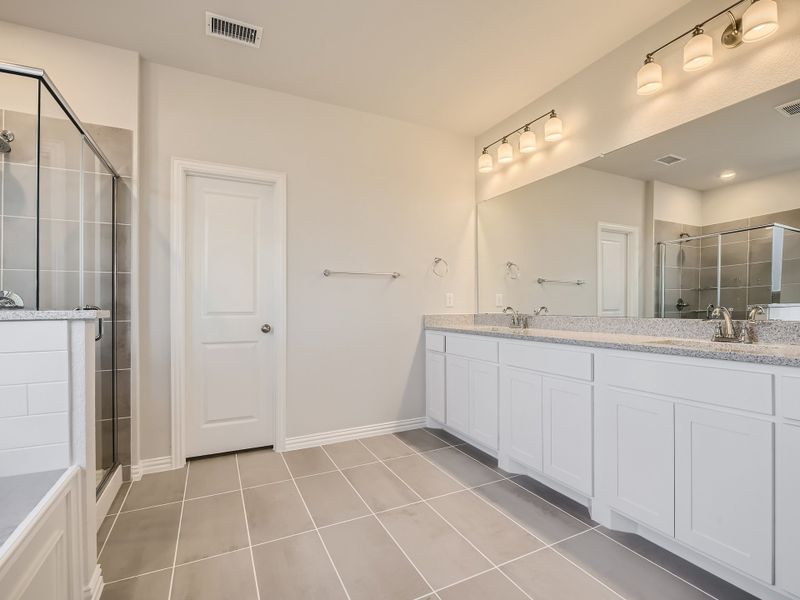 Plan 1533 Main Bathroom Representative Photo by American Legend Homes