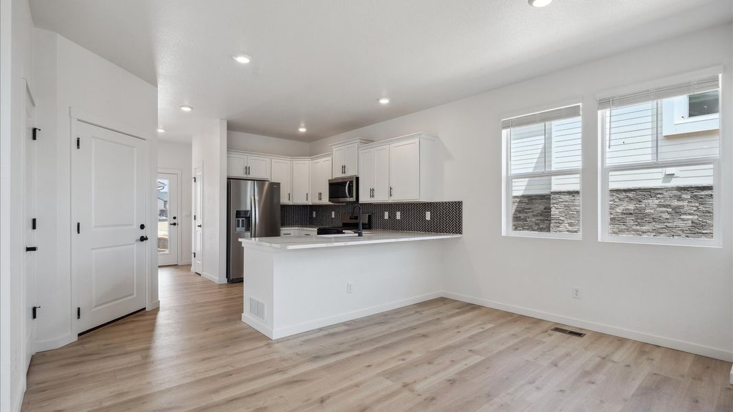 Furnished interior view inside a new home in Horizon Uptown, Aurora (Image 5).
