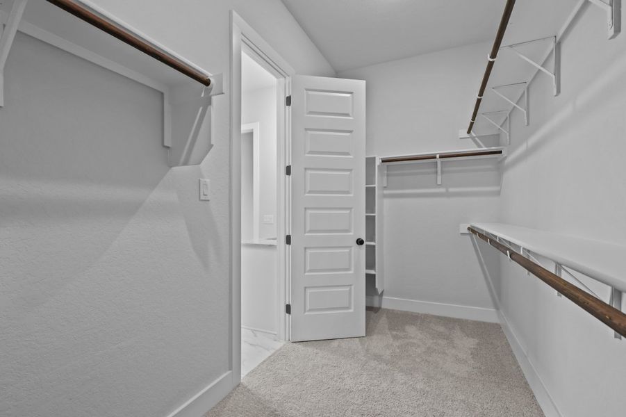 A hallway with white walls. A hallway with white walls.