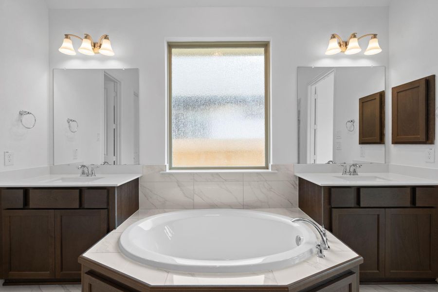 Furnished interior view inside a new home in Coastal Point, League City (Image 9).