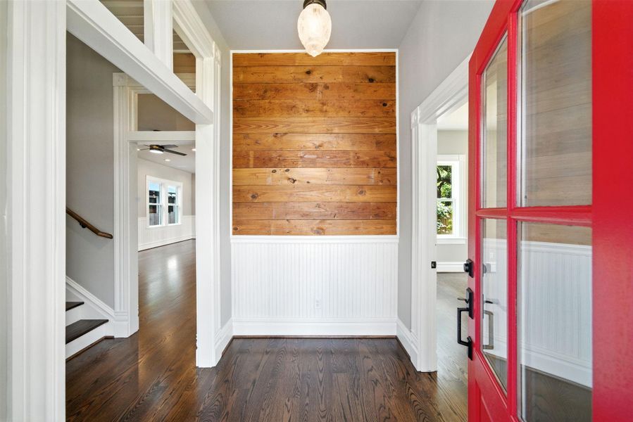Step in through the builder - FW Heritage's signature red front door, into a welcoming entry foyer. Reclaimed shiplap and wainscoting feature in here! Step in through the builder - FW Heritage's signature red front door, into a welcoming entry foyer. Reclaimed shiplap and wainscoting feature in here!