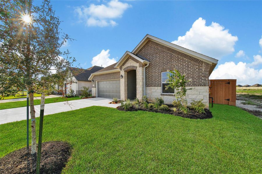 Front exterior of a new home in , Rosharon, TX, highlighting curb appeal (Image 20).