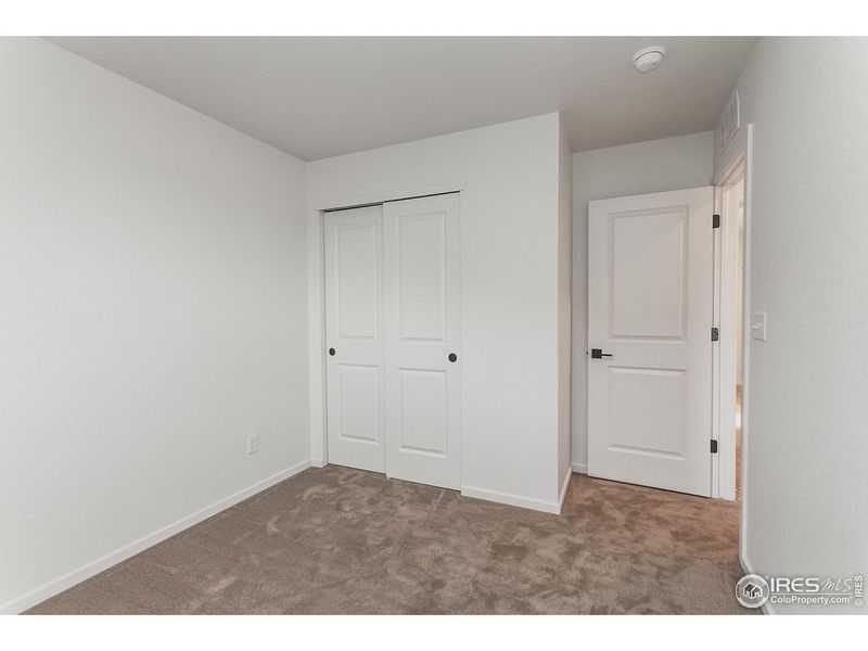 Spacious, unfurnished interior of a new home in Prairie Song Story Collection - Single Family Homes, Windsor (Image 22).