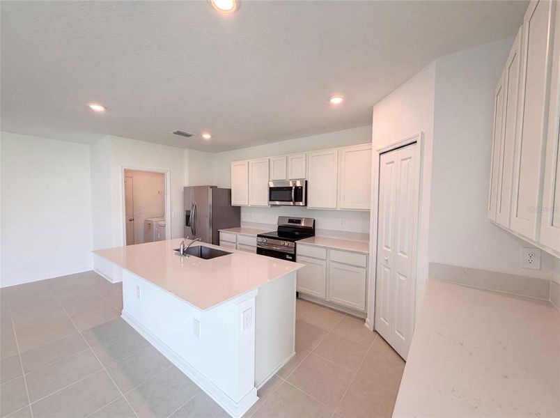 Furnished interior view inside a new home in Ranches at Lake Mcleod, Eagle Lake (Image 8).