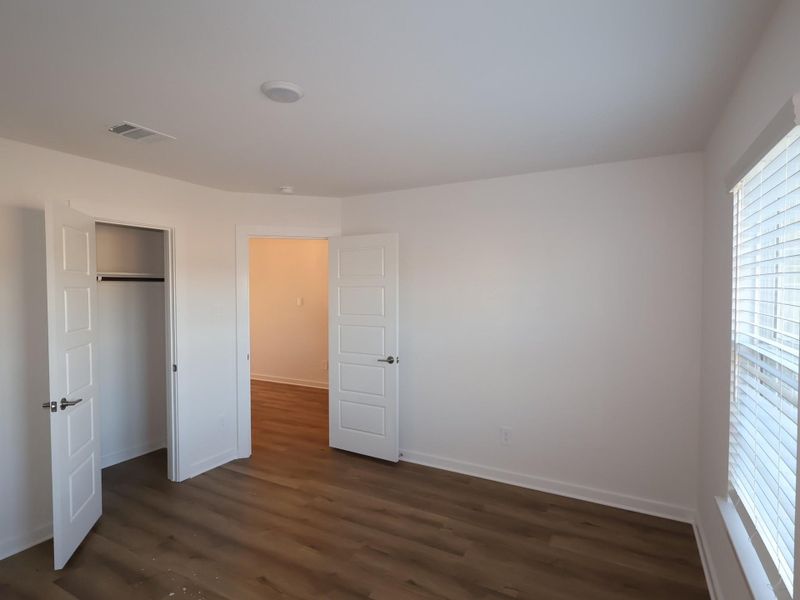 Spacious, unfurnished interior of a new home in Sorella, Tomball (Image 35).