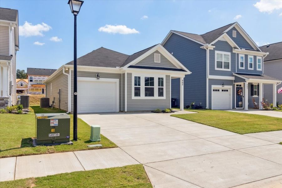 Front exterior of a new home in Windsor, North Augusta, SC, highlighting curb appeal (Image 16). Front exterior of a new home in Windsor, North Augusta, SC, highlighting curb appeal (Image 16).