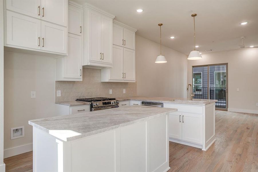 Boutique townhome exterior with premium finishes and a timeless modern edge. Boutique townhome exterior with premium finishes and a timeless modern edge.