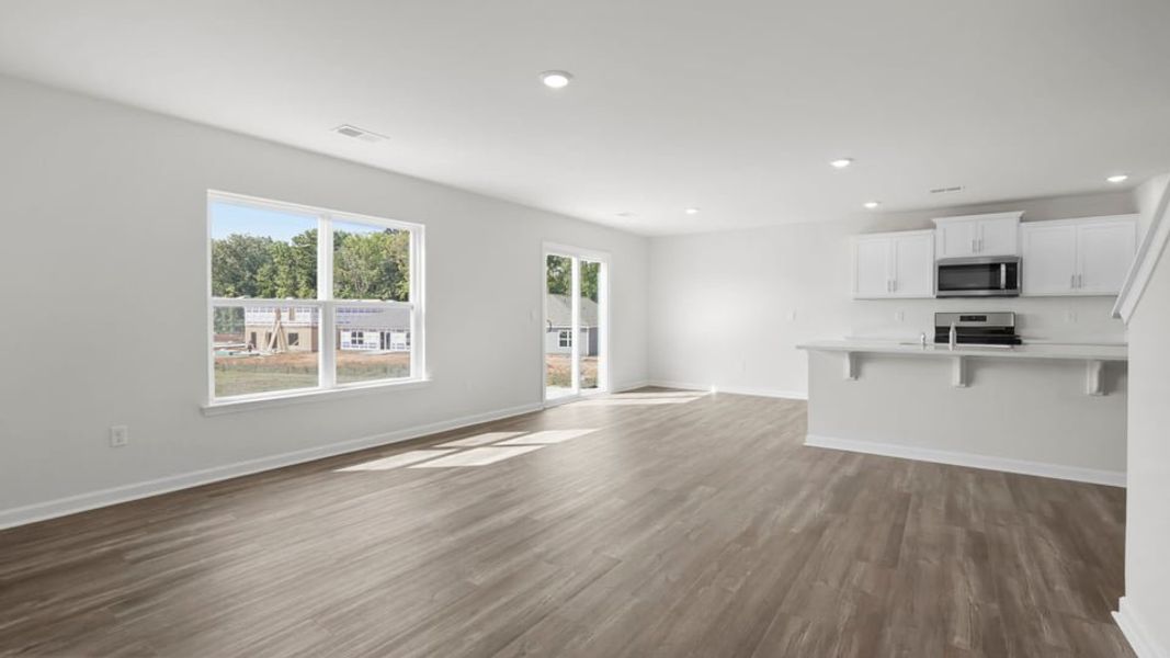 Spacious, unfurnished interior of a new home in Bentley Park, Greenwood (Image 20).