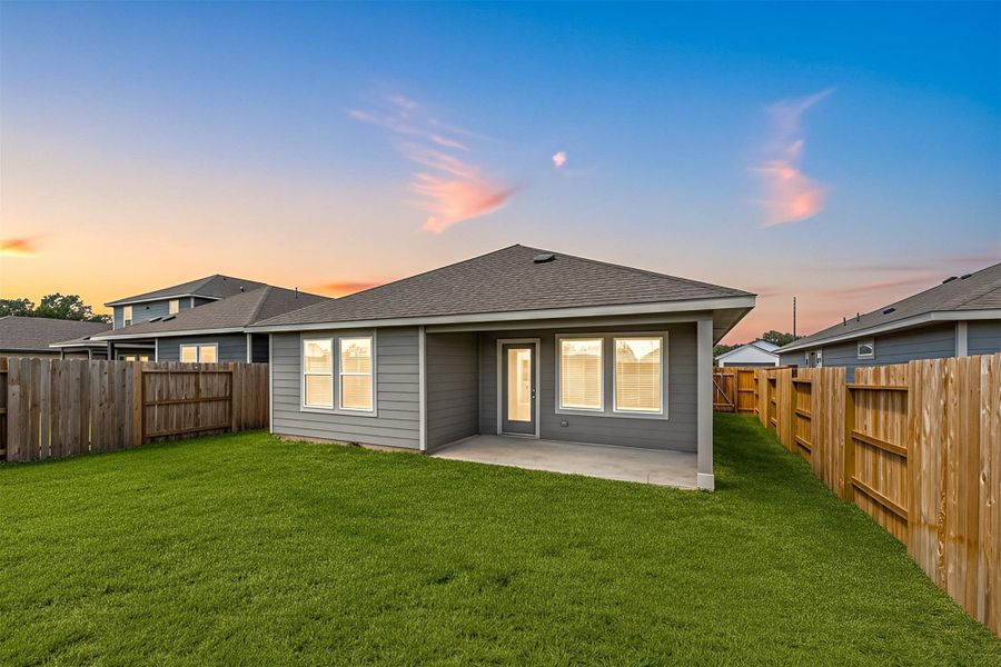 Enjoy evenings in your spacious backyard with a covered patio, perfect for outdoor dining or relaxing as the sun sets. The fully fenced yard offers privacy and plenty of room to play, garden, or unwind.