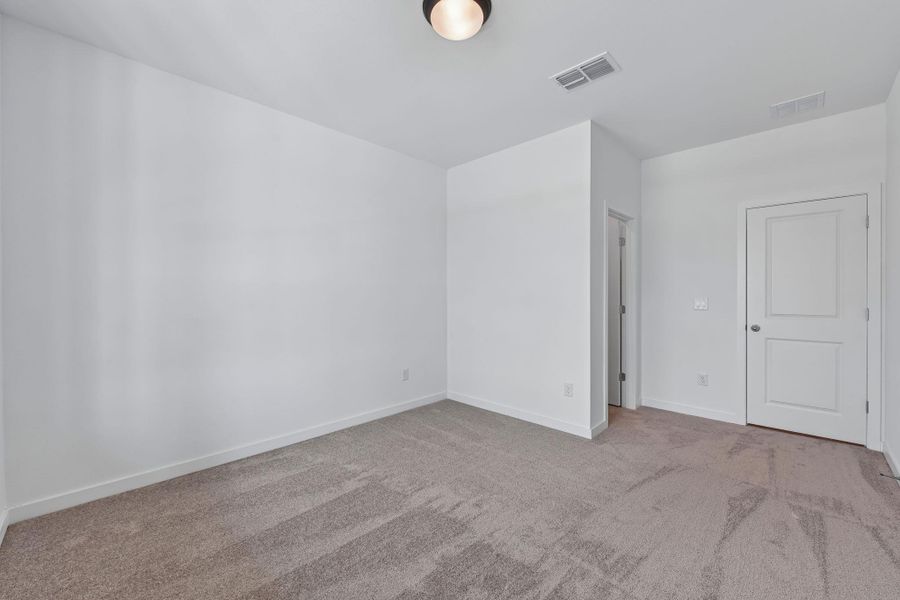 Spacious, unfurnished interior of a new home in Parkton Square, Kyle (Image 33).