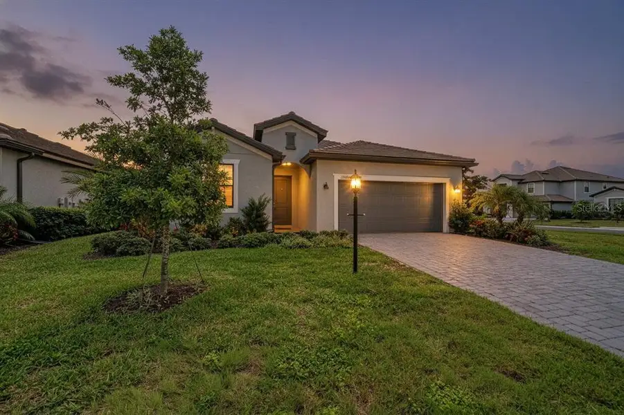 Front exterior of a new home in , Bradenton, FL, highlighting curb appeal (Image 28). Front exterior of a new home in , Bradenton, FL, highlighting curb appeal (Image 28).