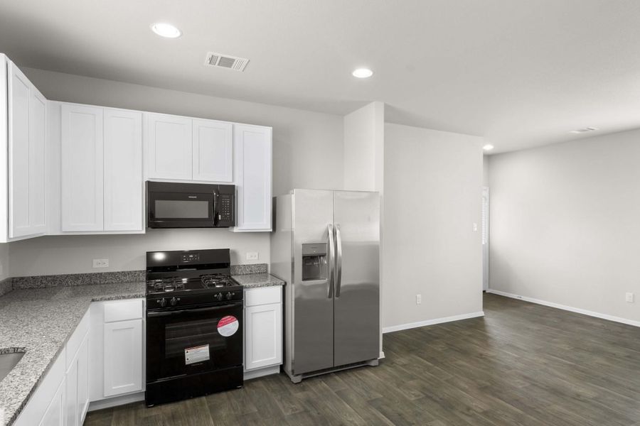Furnished interior view inside a new home in Casetta Ranch, Kyle (Image 6).
