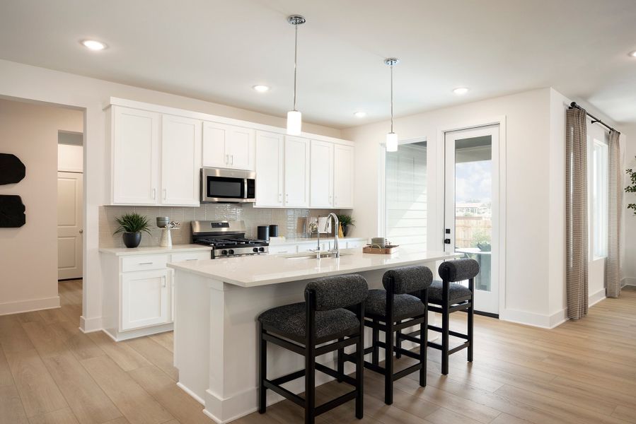 Representative furnished interior of a home built from the 3554 by Risewell Homes in Parkton Square, Kyle (Image 7).