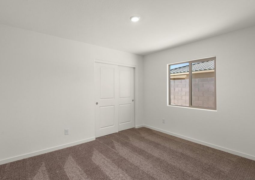 Secondary bedrooms are filled with natural lighting.