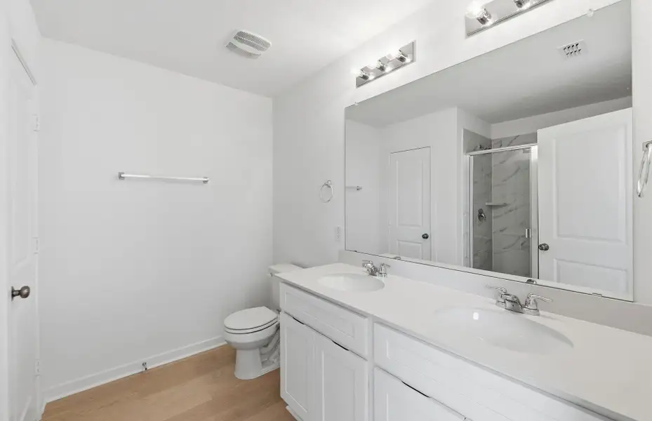 Furnished interior view inside a new home in Cameron Place, Manor (Image 5).