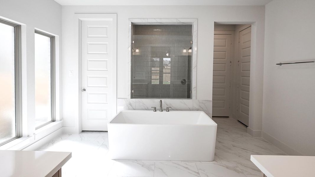 Furnished interior view inside a new home in 6 Creeks, Kyle (Image 6).